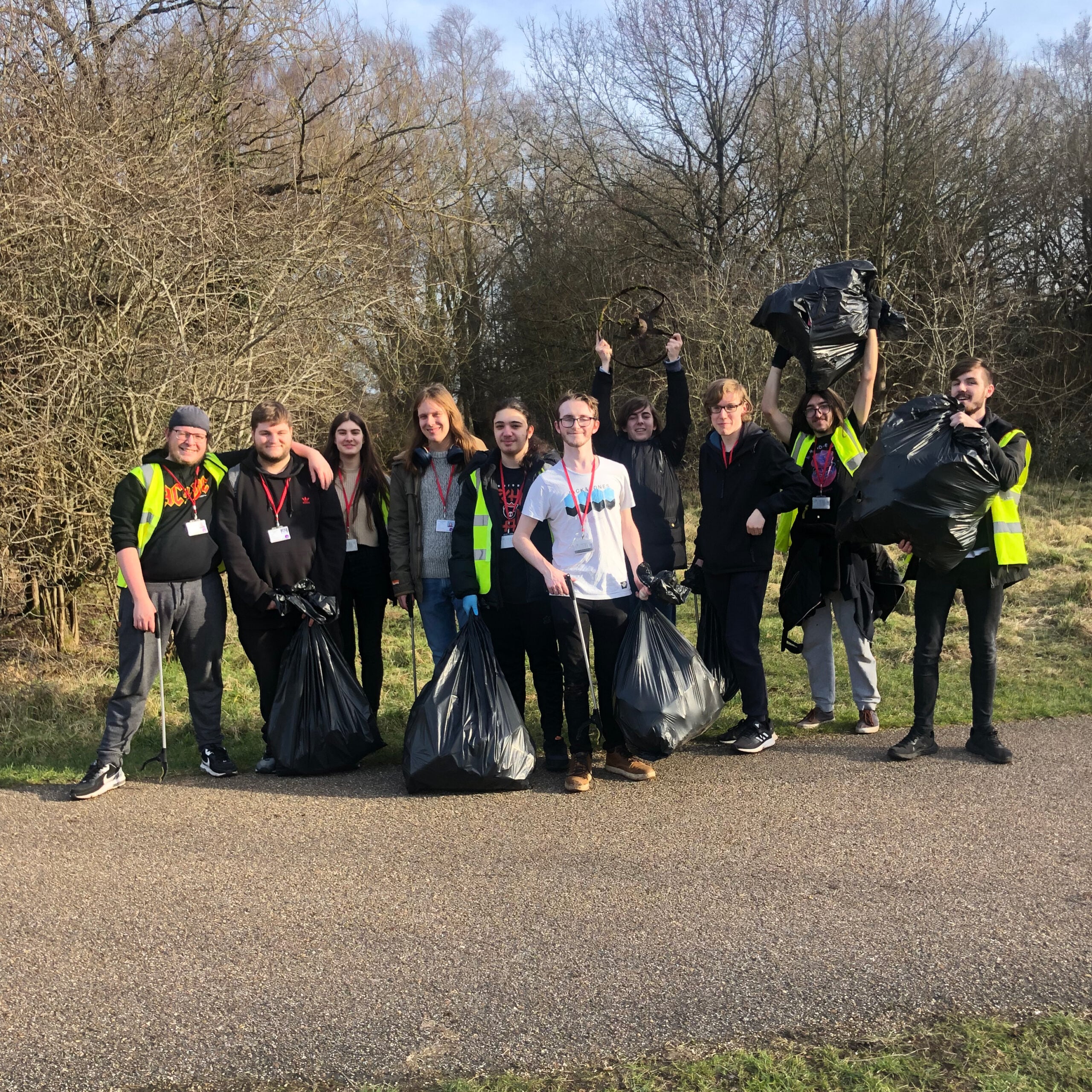 A group of students litter picking 
