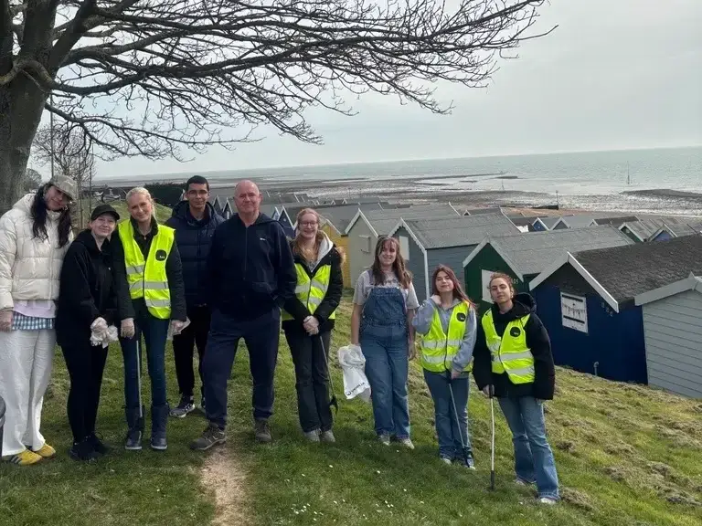 Students litter picking at West Mersea Beach